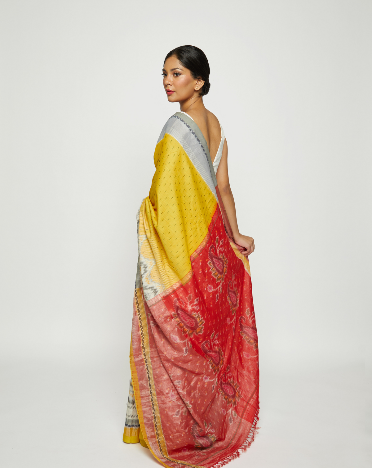 Haridrābhaḥ Handwoven Ikat Eri Silk Saree